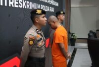 Sosok Jekson Sihombing, ketua ormas di Riau, yang ditangkap atas dugaan pemerasan terhadap perusahaan sawit. (dok. Humas Polda Riau)